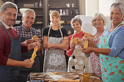 Buy stock photo Cooking, pasta class and portrait of people in kitchen learning recipe for cuisine, culinary and chef skills. Retirement, teacher and and men and women with ingredients, dough and food for dinner