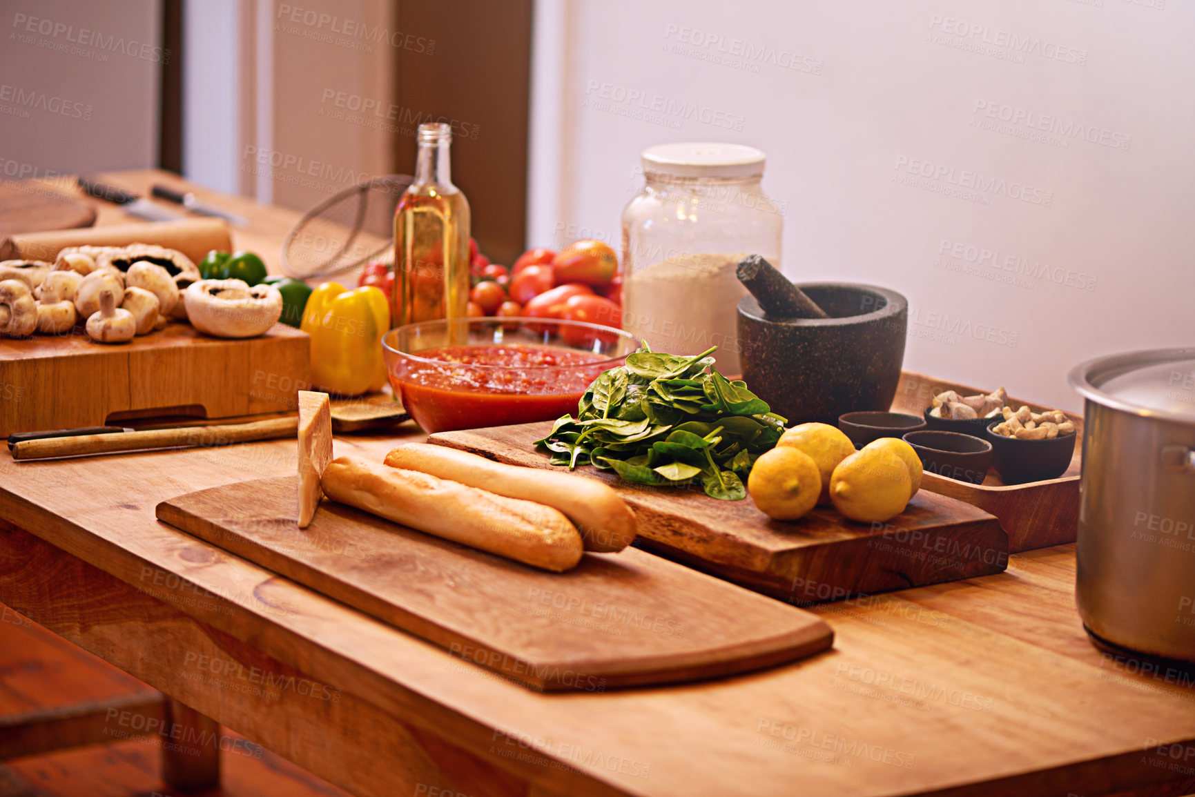 Buy stock photo Cooking, food and ingredients in kitchen on table for meal prep for dinner, supper and lunch in home. Recipe, diet and utensils on counter with vegetables for wellness, nutrition and healthy eating