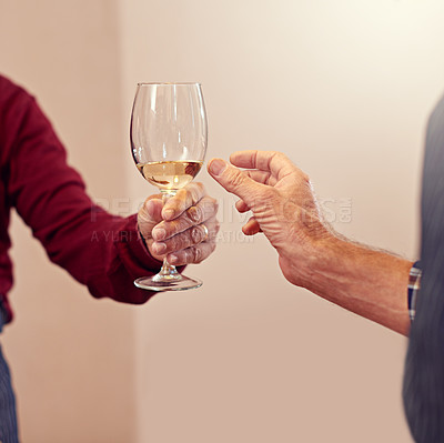Buy stock photo Wine, giving and hands of people in home for toast to lunch, supper and dinner together with friends. Alcohol, share and group with drink, champagne and glasses for celebration, party and event