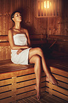 Letting the sauna relax and pamper her