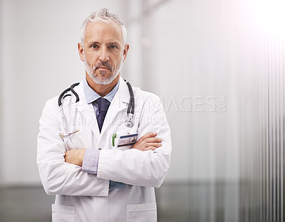 Buy stock photo Doctor, healthcare and portrait of a serious man in a hospital with mockup space for health insurance. Professional male medical worker with a stethoscope for a consultation, healing and wellness