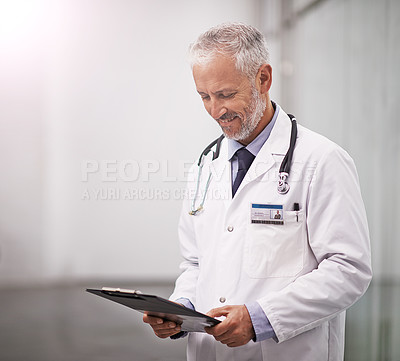 Buy stock photo Healthcare, doctor and man reading clipboard with test results in hospital with health insurance mockup space. Professional male medical worker happy with document for consultation schedule or notes