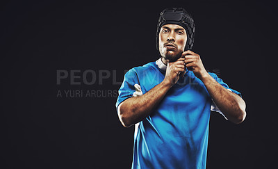 Buy stock photo Black background, portrait and man ready for rugby match or training, serious and focused for fitness. Male player, determination and professional for football game, athlete and strong for workout
