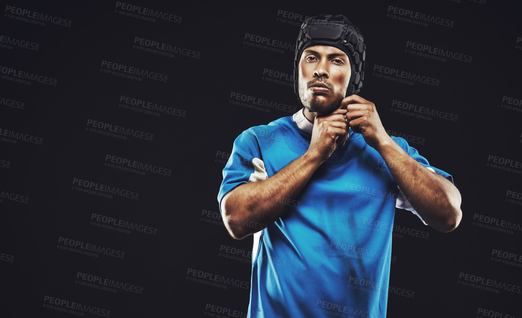 Buy stock photo Black background, portrait and man ready for rugby match or training, serious and focused for fitness. Male player, determination and professional for football game, athlete and strong for workout