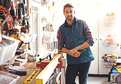 Buy stock photo Carpenter, woodwork and portrait of man in workshop for home development, diy tools and building renovation. Smiling, male employee and contractor for maintenance, equipment and repair work in garage