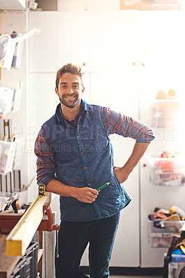 Buy stock photo Carpentry, wood and portrait of man in garage for home development, diy tools and building renovation. Smiling, lens flare and happy male employee with maintenance, equipment and design project