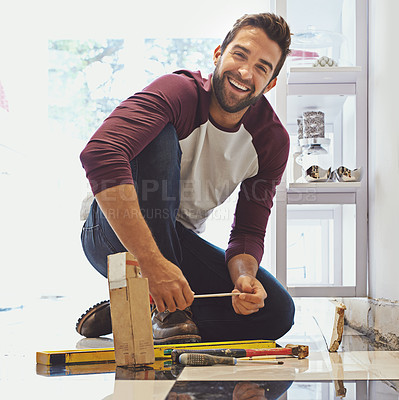 Buy stock photo Portrait of a smiling man laying floor tiles