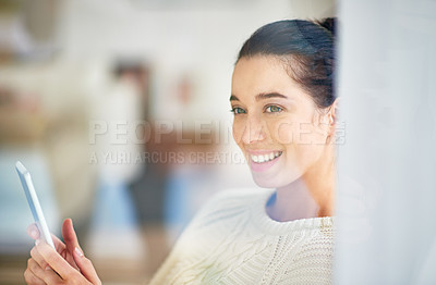 Buy stock photo Shot of  young woman relaxing with a digital tablet at home