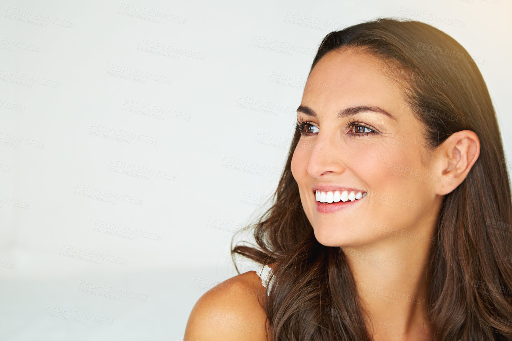 Buy stock photo Shot of a young woman relaxing at home