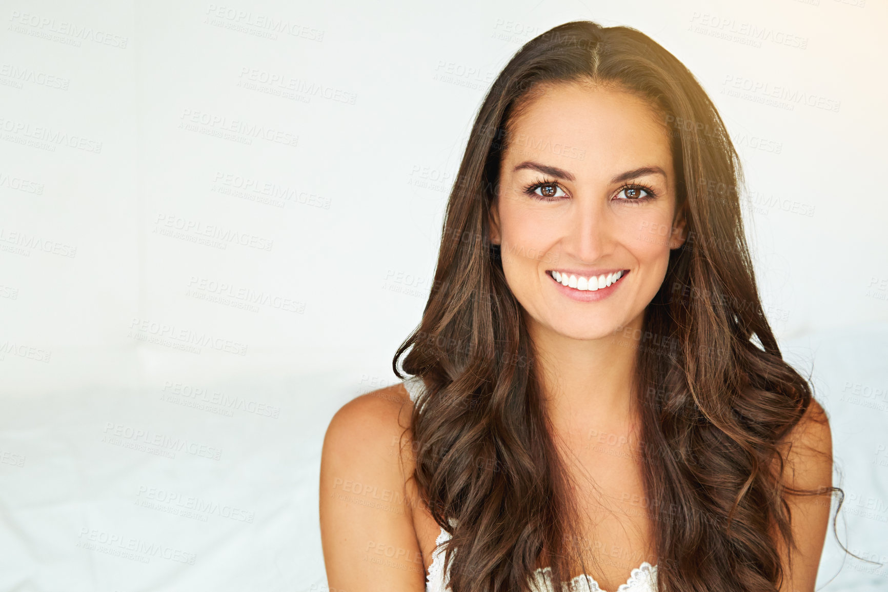 Buy stock photo Portrait of a young woman relaxing at home