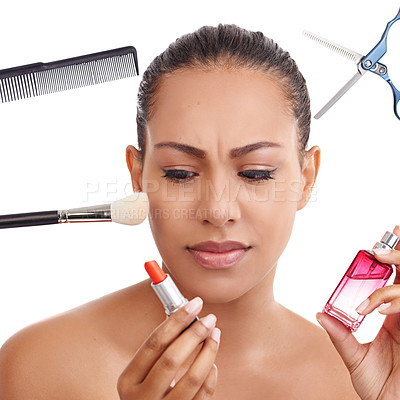 Buy stock photo Studio shot of a young woman surrounded by beauty and style products