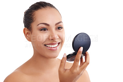 Buy stock photo Shot of a beautiful woman using a compact mirror isolated on white