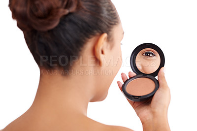 Buy stock photo Shot of a woman's eye reflecting on her compact mirror