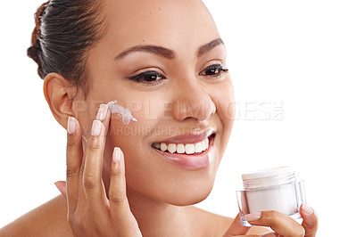 Buy stock photo Happy woman, skincare and container with beauty cream for moisturizing on a white studio background. Face of female person, brunette or model with smile, lotion or SPF for anti aging in dermatology