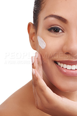 Buy stock photo Happy woman, portrait and skincare with face cream for beauty or moisturizing on a white studio background. Female person, brunette or model with smile for anti aging, lotion or SPF in dermatology