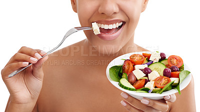 Buy stock photo Cropped studio shot of a woman eating a salad against a white background