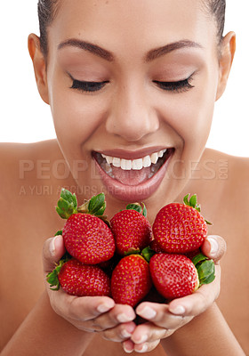 Buy stock photo Hands, woman and strawberry in studio for diet, bite and nutrition on white background. Fruit, detox or weight loss and benefits for antioxidants, digestion and vitamin or mineral from natural food