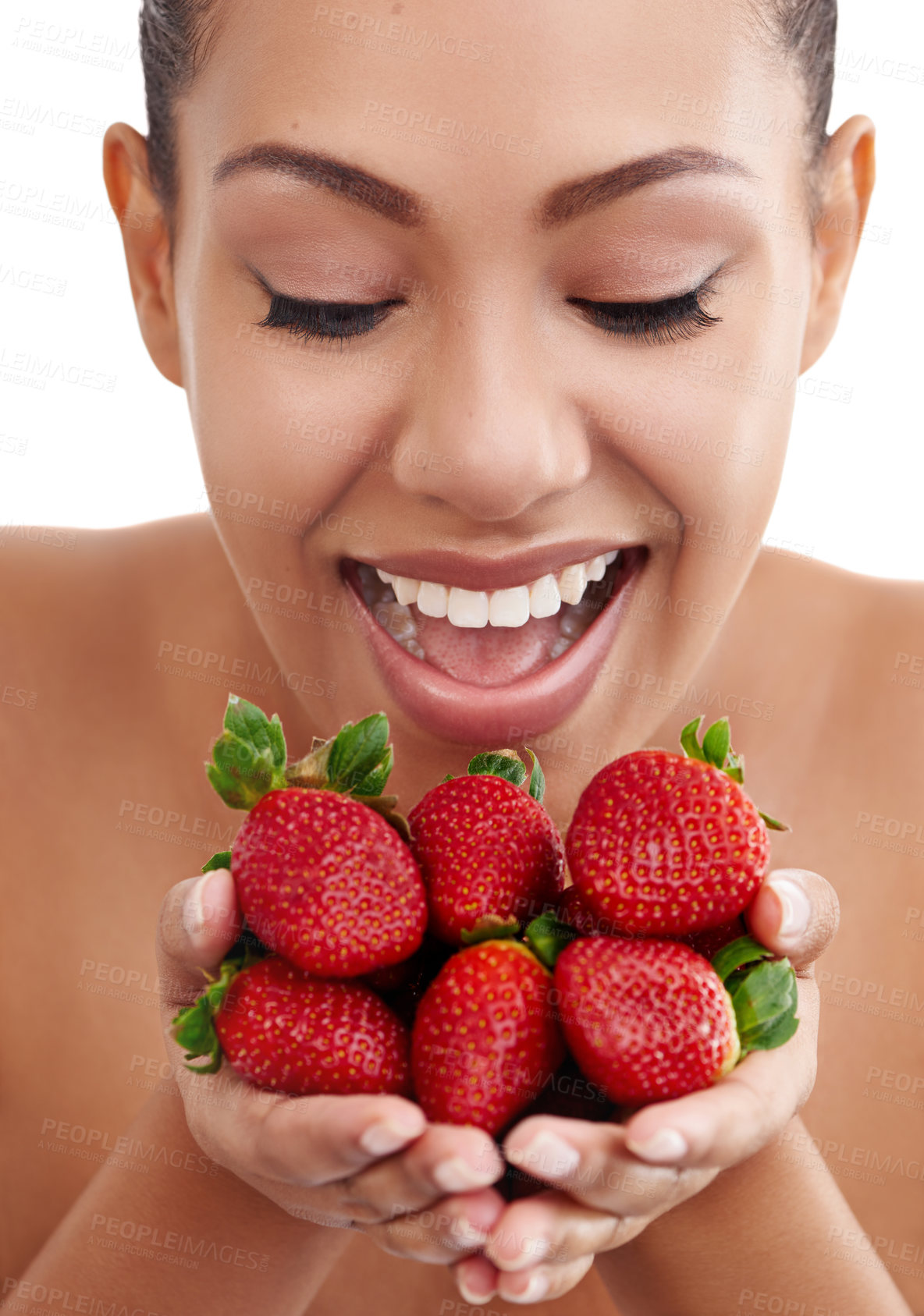 Buy stock photo Hands, woman and strawberry in studio for diet, bite and nutrition on white background. Fruit, detox or weight loss and benefits for antioxidants, digestion and vitamin or mineral from natural food