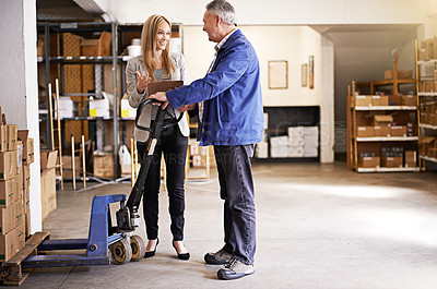 Buy stock photo People, manager and clipboard for inspection in warehouse, distribution and logistics industry with discussion. Checklist, inventory management and pallet jack for boxes with supply chain and storage