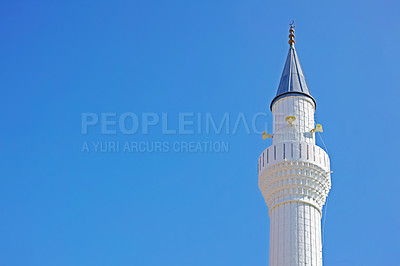 Buy stock photo A Minaret in Bodrum, Turkey. A minaret is a feature of Islamic architecture and is the place from where the call to prayer is sent out. They are also known as a manÄr or manÄra in Arabic, meaning place of fire or light (nar or nur). According to scholars, the expression manÄra was adapted from the Aramaic language, which when translated means â??candlestickâ?.