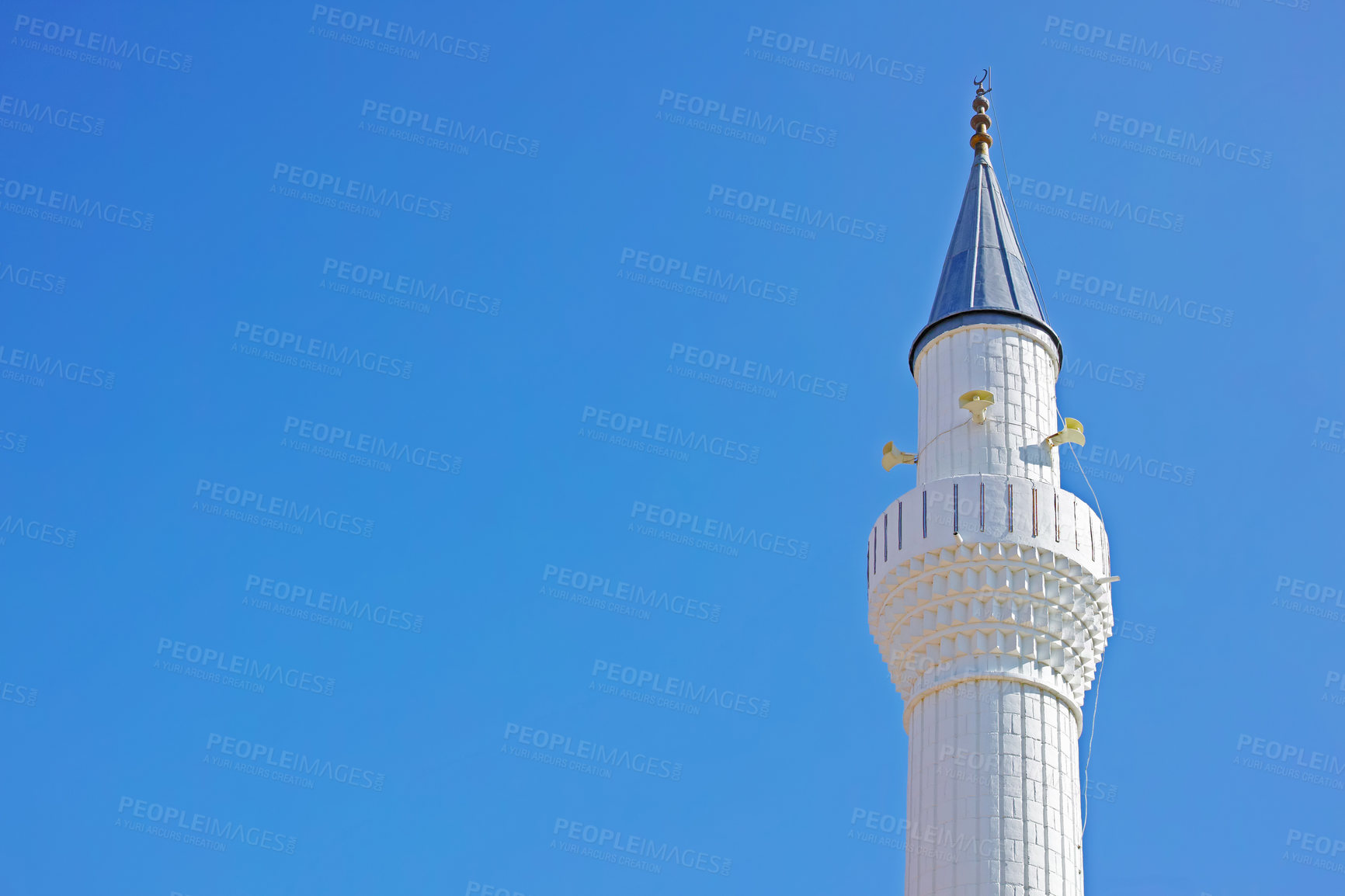 Buy stock photo A Minaret in Bodrum, Turkey. A minaret is a feature of Islamic architecture and is the place from where the call to prayer is sent out. They are also known as a manÄr or manÄra in Arabic, meaning place of fire or light (nar or nur). According to scholars, the expression manÄra was adapted from the Aramaic language, which when translated means â??candlestickâ?.