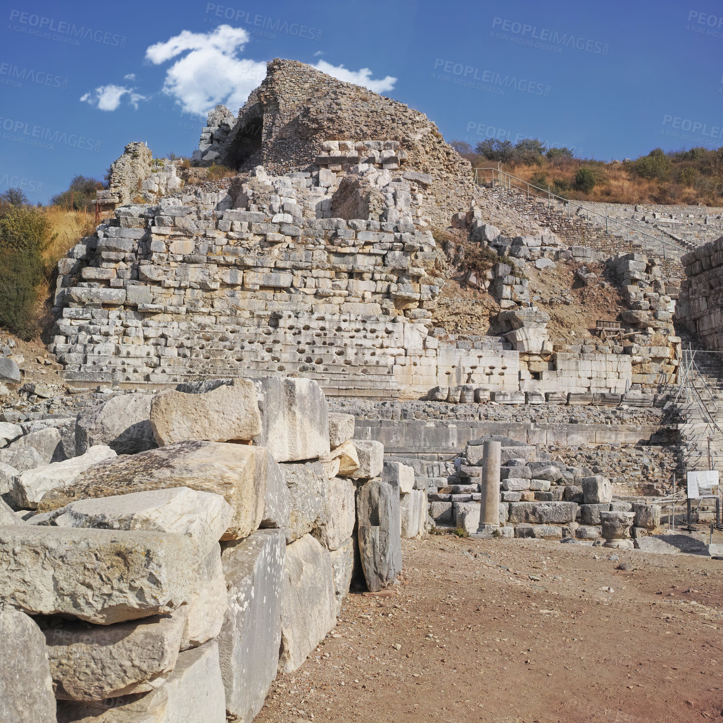 Buy stock photo Ancient city ruins of Ephesus in Turkey during the day. Travel abroad and overseas for holiday, vacation and tourism. Excavated remains of historical building stone from Turkish history and culture