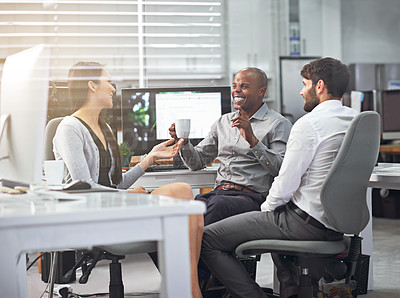 Buy stock photo Shot of coworkers having a chat at the office