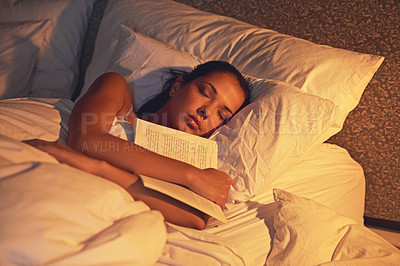 Buy stock photo Woman, sleep and book in room and light, dreaming female person or night lamp for story and novel. Relax, hobby and tired girl with fantasy or biography, literature or learning for peaceful rest