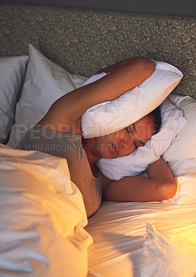 Buy stock photo Pillow, annoyed and woman upset from insomnia, frustrated and stress with fatigue in night. Bedroom, female person and girl unhappy with anxiety, mental health and sleepless with depression and cover