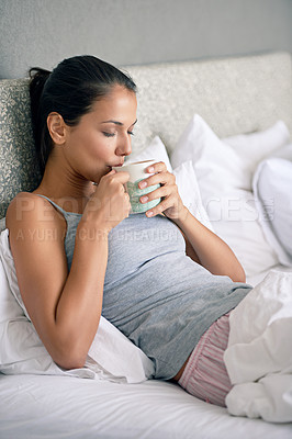 Buy stock photo Woman, drinking coffee and bed for morning caffeine on weekend or relaxing break, day off or leisure. Female person, beverage and linen in apartment with for Sunday holiday or peace, resting or calm