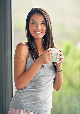Buy stock photo Woman, portrait and drinking coffee at window view with smile in apartment for holiday, weekend or vacation. Female person, face and caffeine beverage in London or calm in bedroom, resting or pyjamas