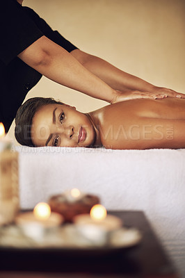 Buy stock photo Back massage, portrait and relax with woman in spa for health, skincare or stress relief on bed. Aromatherapy, beauty and wellness with customer at luxury resort for natural treatment or recovery