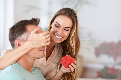 Buy stock photo Surprise, gift and couple in home with eyes closed for anniversary, valentines day and celebration. Love, marriage and man and woman with present, box and package for birthday, romance and commitment