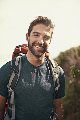 Buy stock photo Hiking, smile and portrait of man on mountain for fitness, adventure and travel journey. Backpack, summer and workout with face of male hiker trekking in nature path for training, freedom and explore