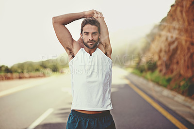 Buy stock photo Road, runner and stretching of man, portrait and training for energy in nature of city of Cape Town. Adult, male person on highway, happy and sport with exercise to relax, wellness and healthy