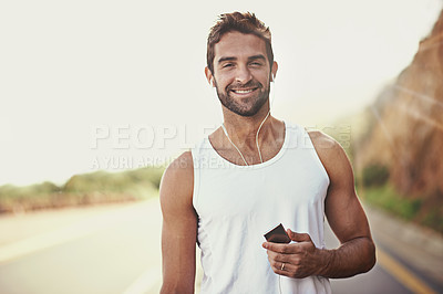 Buy stock photo Fitness, headphones and portrait of man on road for exercise, training and workout music at countryside. Male person, earphones and face with happiness for audio, streaming or podcast in Australia