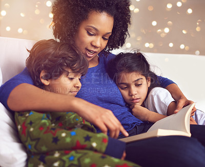 Buy stock photo Children, mother and reading a book in a family home for story time on lounge sofa with bokeh. A woman or mom with kids together for development, learning and love with a fantasy, magic or fairytale