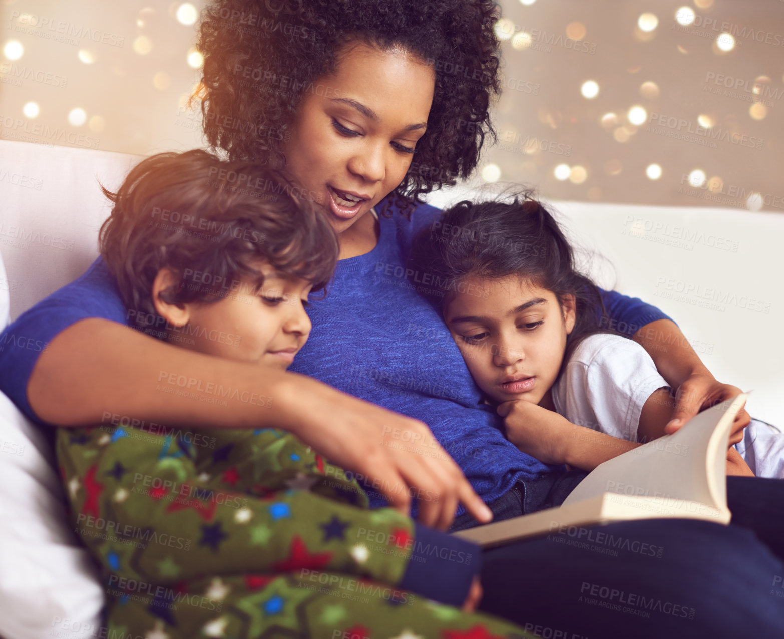 Buy stock photo Children, mother and reading a book in a family home for story time on lounge sofa with bokeh. A woman or mom with kids together for development, learning and love with a fantasy, magic or fairytale