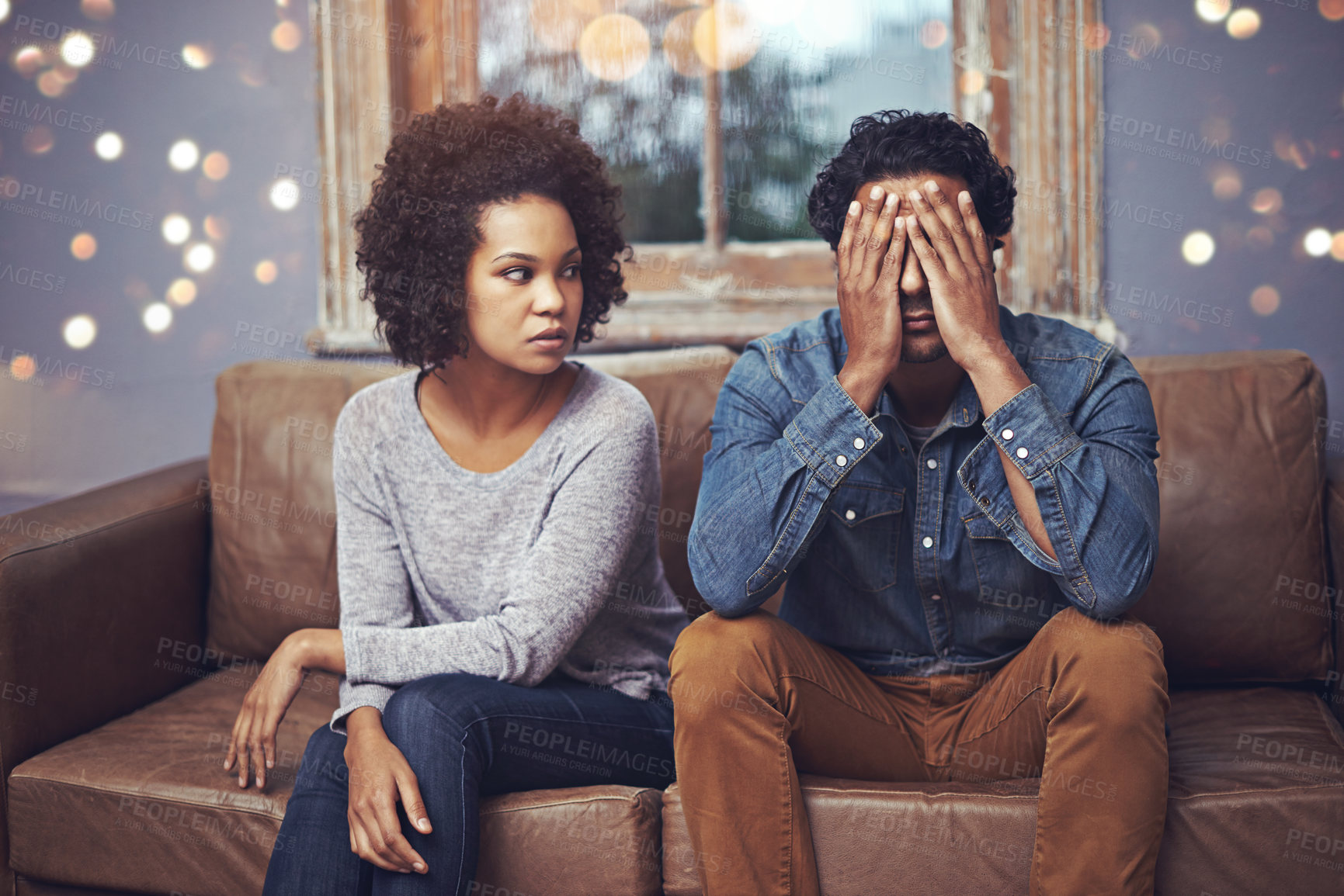 Buy stock photo Shot of a couple having relationship problems at home