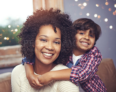 Buy stock photo Mother, child and portrait embrace on sofa or love connection or support comfort in apartment, relaxed or calm. Female person, son and hug bonding in living room or bokeh lights, together or house