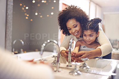 Buy stock photo Water, cleaning and washing hands by mother and child in a bathroom for learning, hygiene and care. Basin, wash and hand protection by mom and girl together for prevention of bacteria, dirt and germs