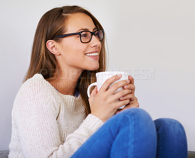 Buy stock photo Thinking, coffee and smile of woman in living room home enjoying caffeine, espresso or cappuccino. Happiness, tea and female person with idea in lounge, drinking latte beverage and relax in house.