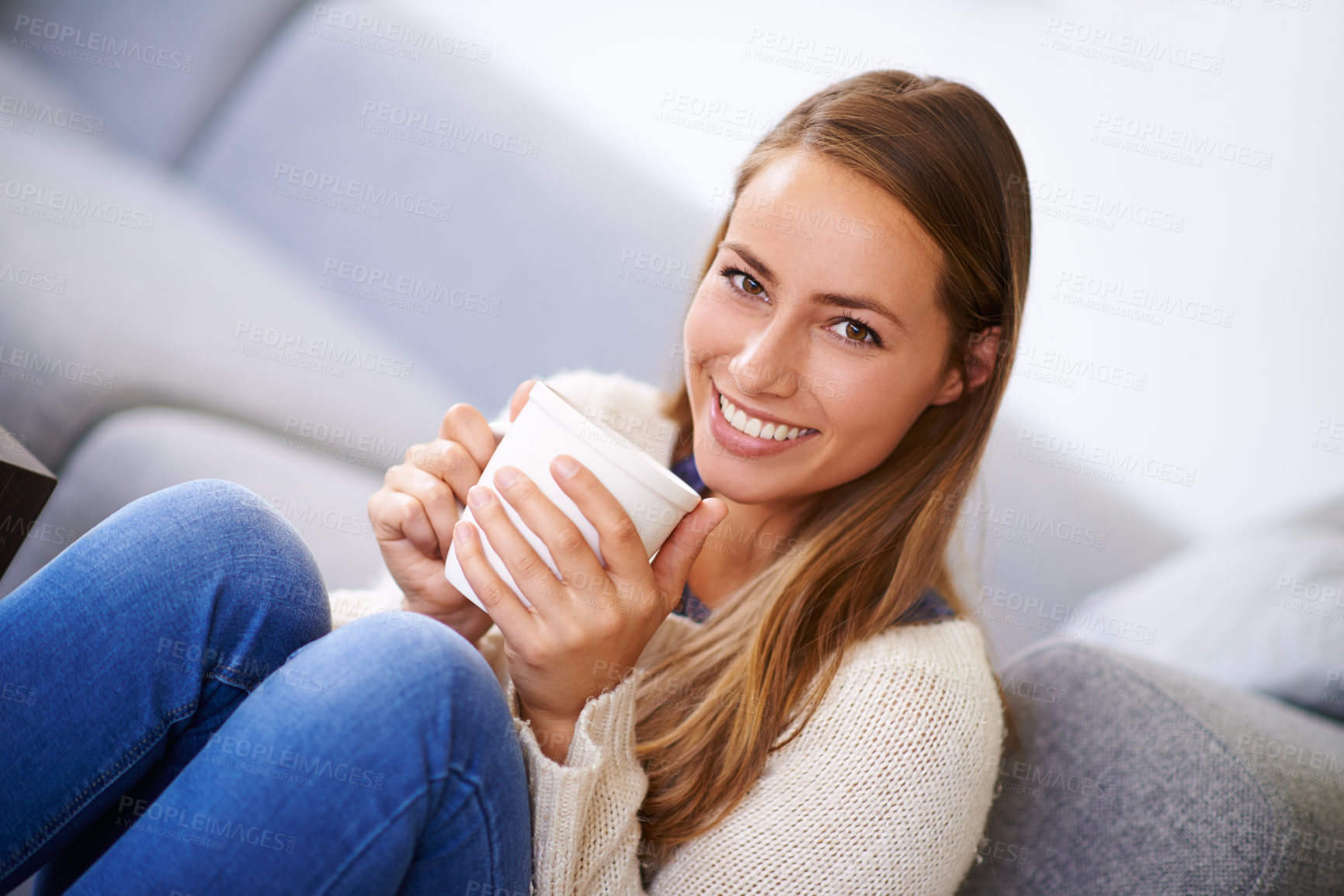 Buy stock photo Happy, woman and portrait with cup of coffee in living room for relax peace and addiction in morning. Smile, female person and warm beverage in home for chilling, break and rest by sofa with caffeine