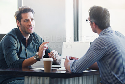 Buy stock photo Meeting, laptop and business men at coffee shop for planning, conversation and talking. Professional, collaboration and people in restaurant on computer for feedback, online project and discussion