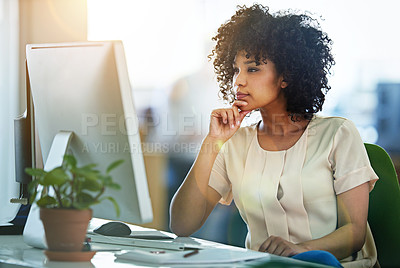 Buy stock photo Thinking, computer and woman employee reading information or email online, internet or web in an office. Young, desk and person or receptionist contemplating a project in an agency or startup