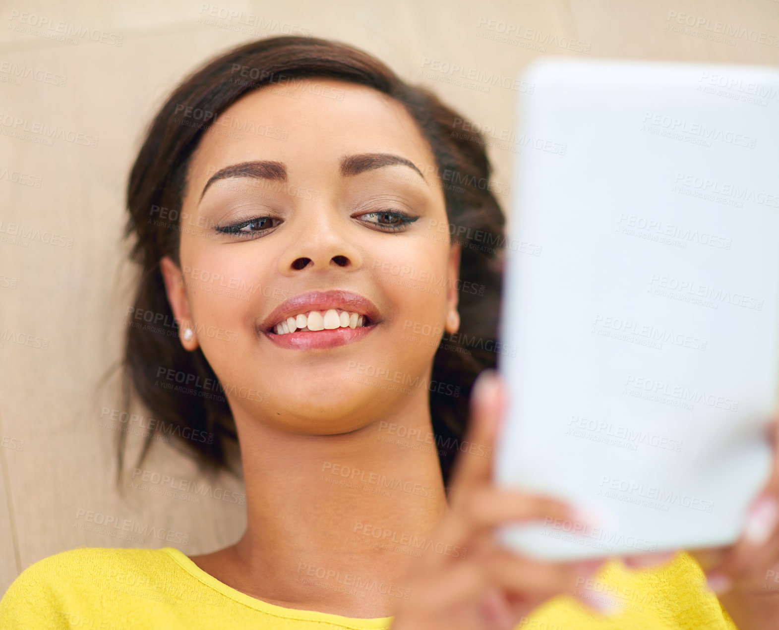 Buy stock photo Woman, tablet and internet on floor for pleasure with streaming music, watching movies and relaxing. Technology, online and girl in house for entertainment, enjoyment and social media communication