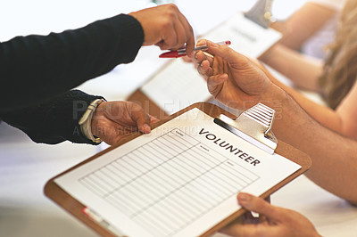 Buy stock photo Cropped shot of volunteer getting signatures for church donations