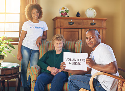 Buy stock photo Shot of volunteer workers at a retirement home