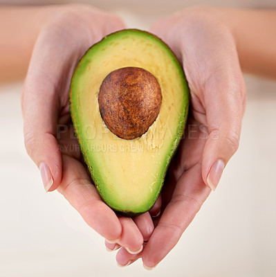 Buy stock photo Hands, avocado and vegetable diet for wellness, health and minerals or antioxidants for nutrition. Closeup, person and holding vegan food for green detox, superfoods and omega 3 for organic skincare
