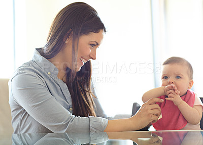 Buy stock photo Mother, baby child and chair for play, bonding and love at table with smile, morning and happiness. Mom, infant kid and happy together in family home for development, help or care in living room